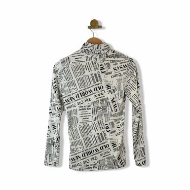 Wing Newsprint Turtleneck
